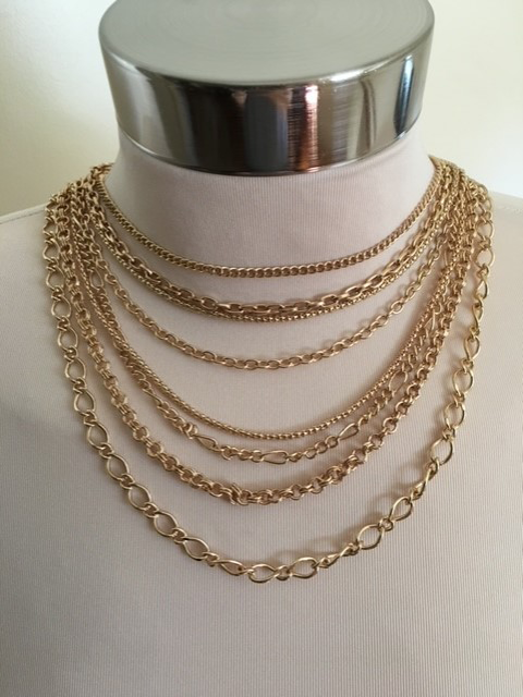 gold necklaces stacked