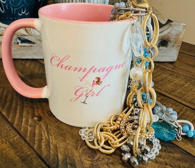 Picture of a coffee mug with the text Champaign Girl